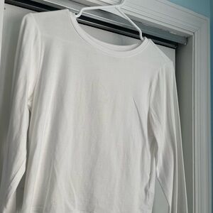 White long sleeve cropped shirt.